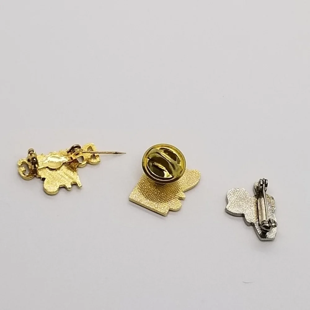 trio of bowling accomplishment pins